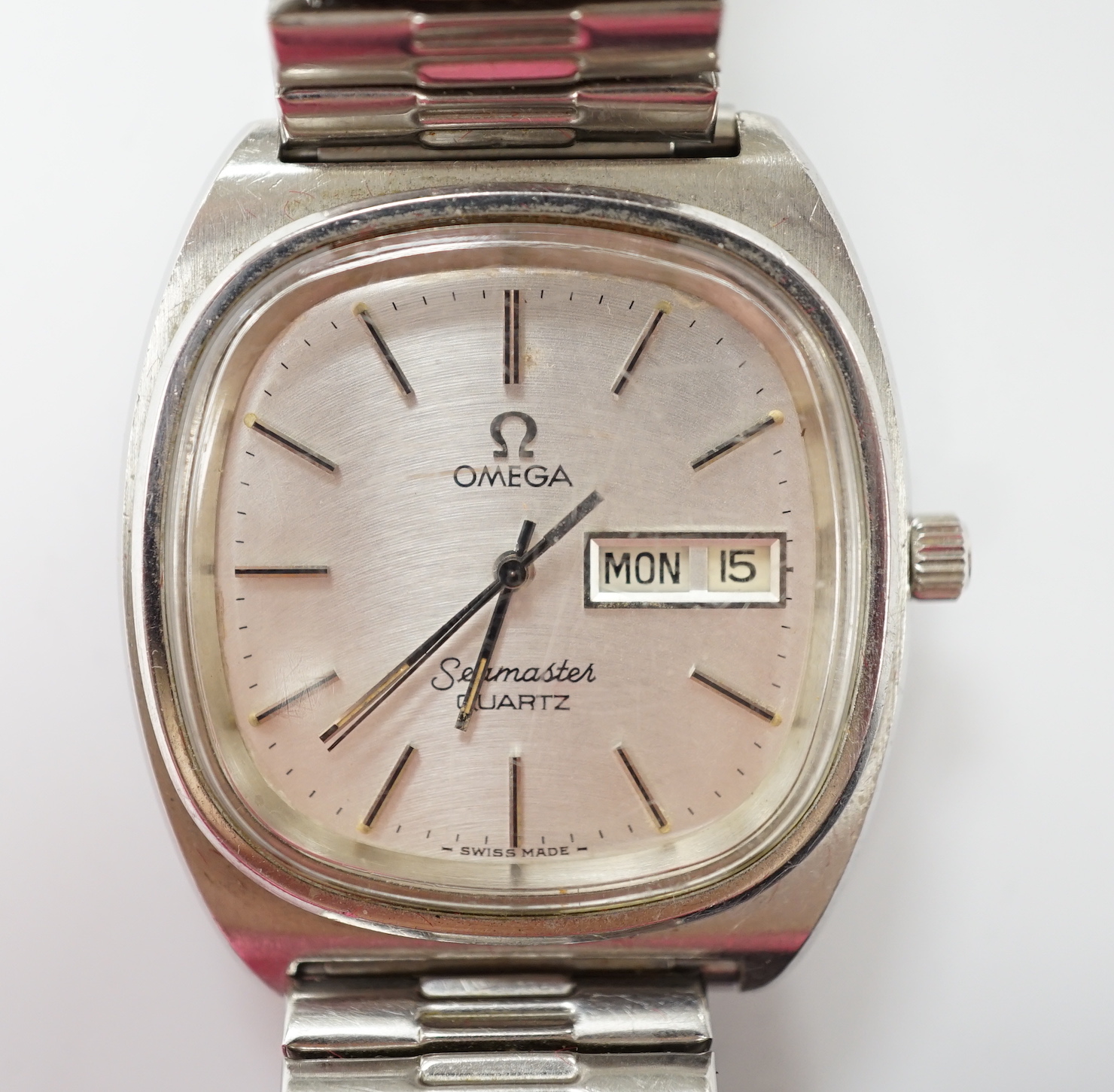 A gentleman's 1980's stainless steel Omega Seamaster quartz wrist watch, with day date aperture, on associated flexible strap, with box and papers.